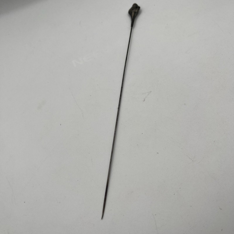 Vintage Victorian sterling silver hatpin With dimensional, repousse design.