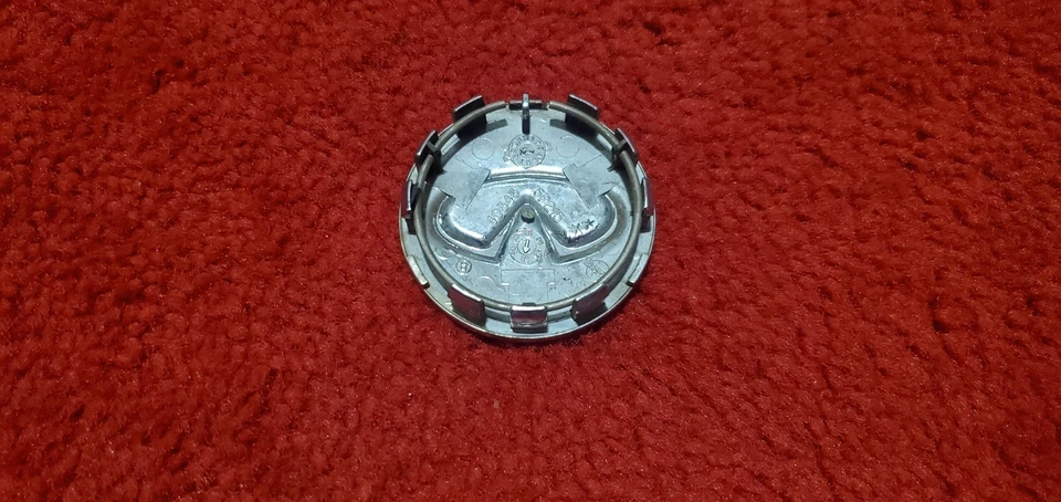 INFINITI EX35 EX37 G35 G37 I30 I35 JX35 M37 M45 Q40 TAPACUBOS CENTRO OEM FC-33 Foto 2 de 3