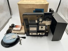 Bell and Howell 469A Multi Motion Auto 8 Cassette Movie Projector Boxed Extra’s