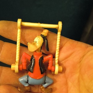 Walt Disney Productions Goofy Figurine on Swing Disney Franchise