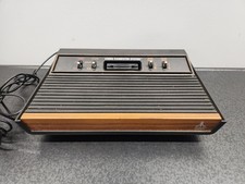 Atari 2600 CX-2600A Wood Grain 4 Switch Conso...