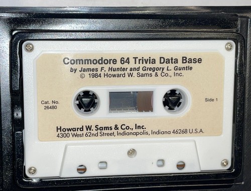 Vintage Commodore 64 Trivia Data Base Clamshell w Cassette, Floppy Disc, & Book - Picture 7 of 13