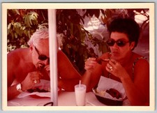 Vtg Color Snapshot Couple Eating Chicken Wings Lunch Outdoors In Swimwear 1970s