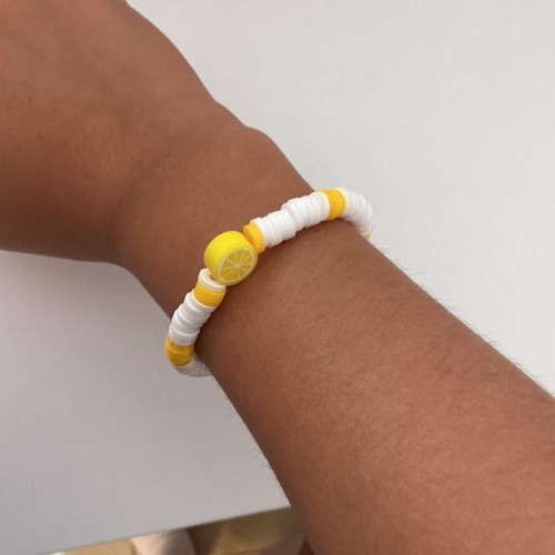White & Yellow Plastic Beaded Stretch Bracelet w/ Lemon Dangle Charm