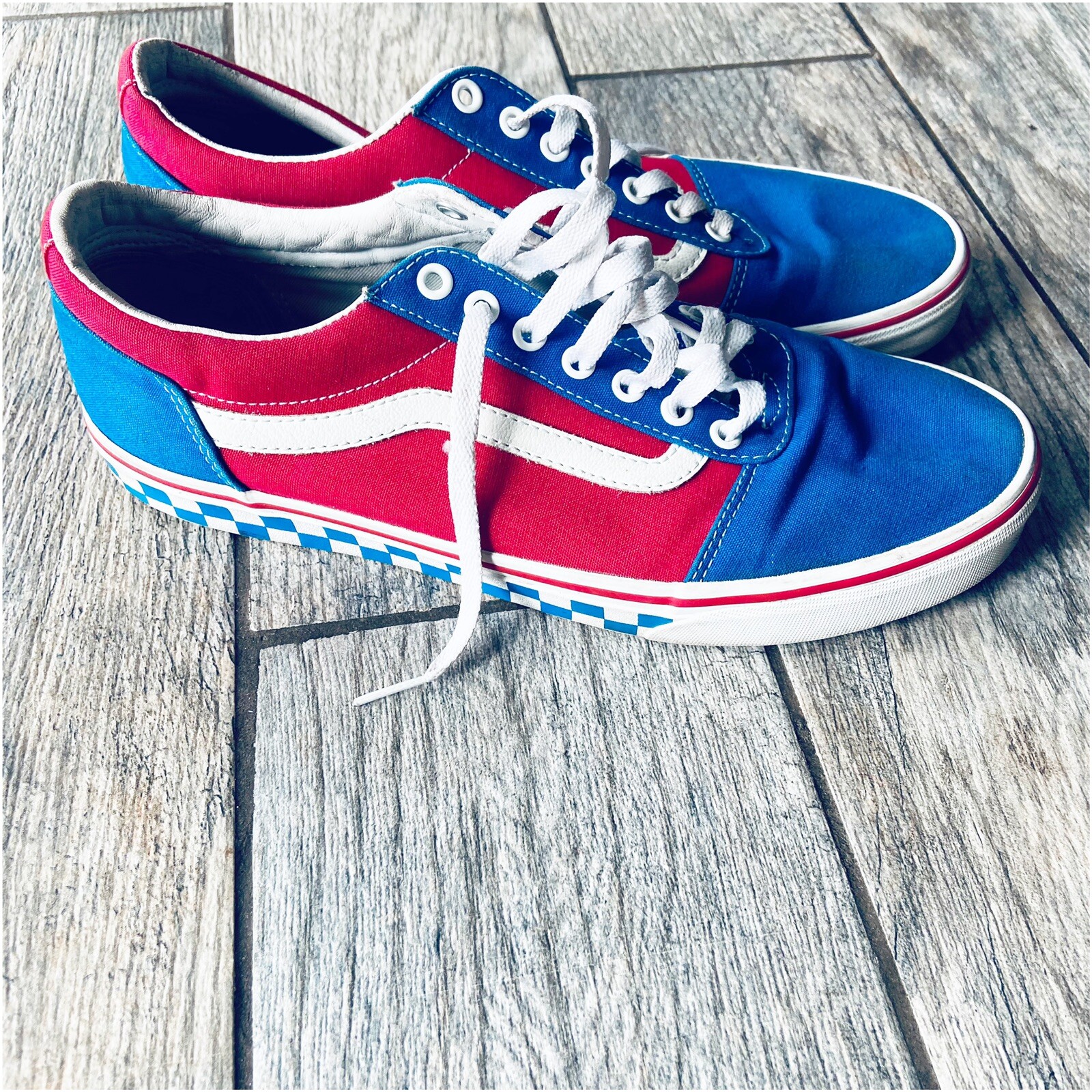 red and white low top checkered vans