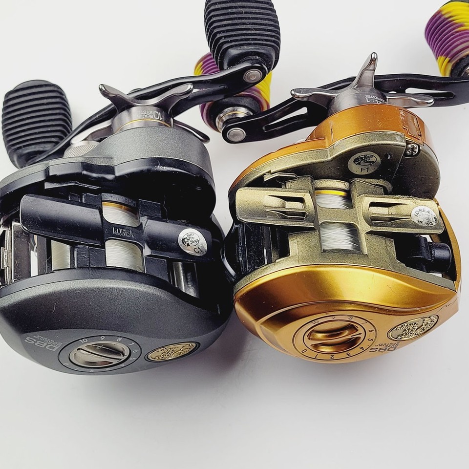 2 Bass Reels Low Profile Baitcasting Lot - Johnny Morris BPS Carbonlite ...