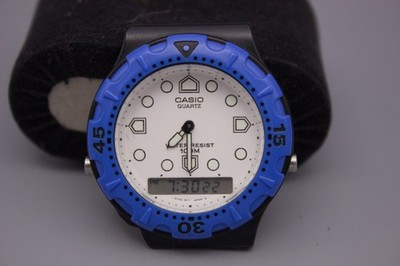Vintage Casio AW-304 Ana-Digi Blue Bezel 100M Watch Runs New Battery No Band
