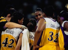 Lisa Leslie Center for the Los Angeles Sparks talks to her team ma- Old Photo