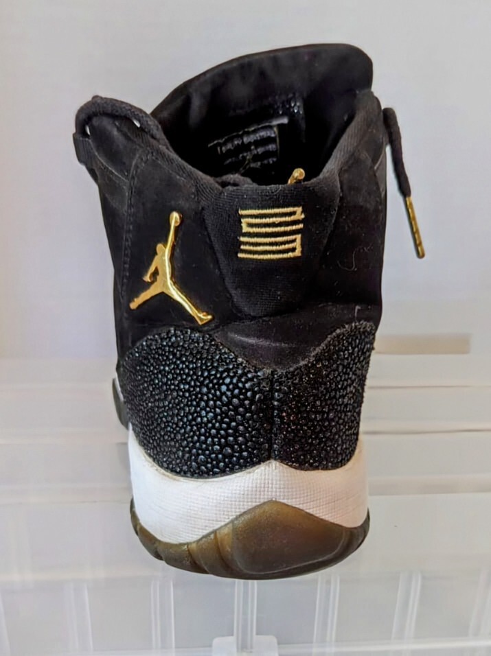 black jordans with gold sparkles