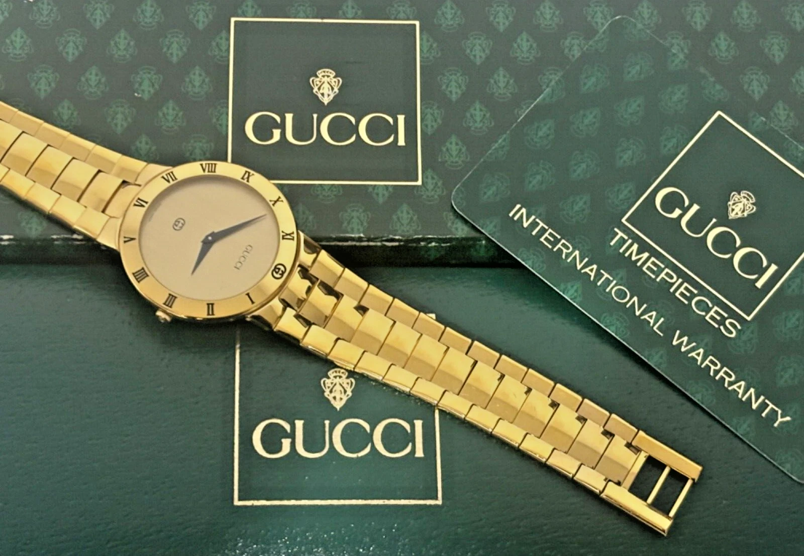 Montre Gucci 3300M plaqué or 18 carats Gucci bracelet suisse authentique excellent état