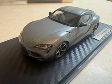 Kyosho Toyota GR Supra 1/43 Matte Storm Gray Mini Car with Carbon Base Case
