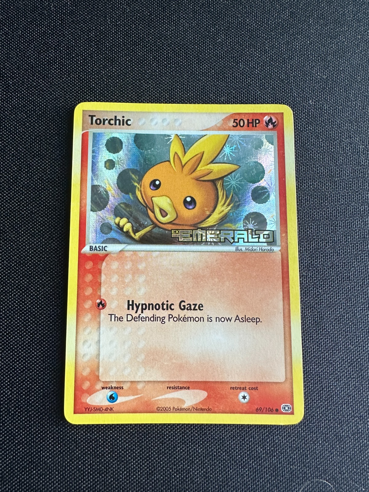 Torchic 69/106 EX Emerald 2005 Reverse Holo Foil Stamped Pokémon Card-Print Line