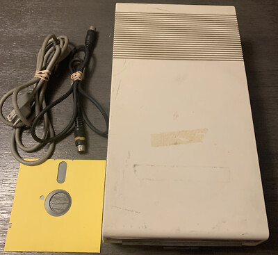 Vintage Commodore VIC-1541 Disk Drive, cables and a disk, powers on but untested