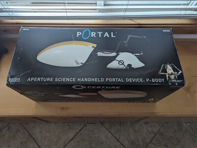 NECA Aperture Science Handheld Portal Device | P-Body | SDCC