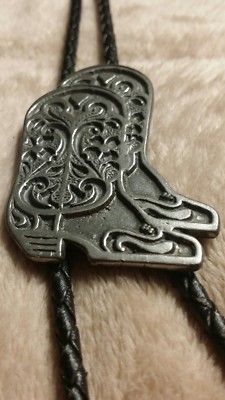 Bolo tie cowboy boots silvertone signed Ege C 91  leather cord metal tips