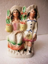 Antique Staffordshire Figurines Couple Holding Bookey Or Planter Christmas"F9