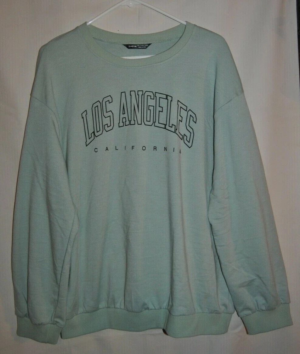 White and cheap green sweatshirt