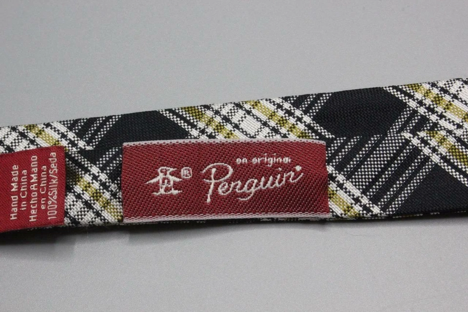 Pajarita de seda ajustable PENGUIN. Cuadros negros con amarillo dorado. Foto 3 de 3