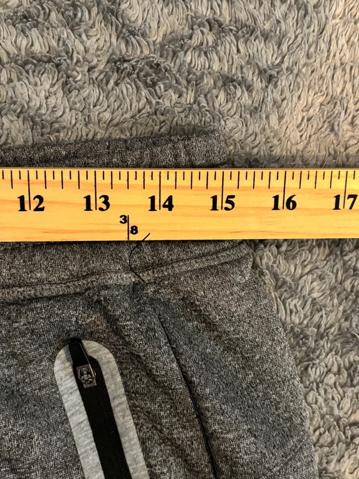 Pantalones de chándal RBX para hombre gris medio con puños con cremallera bolsillos activos gimnasio Foto 3 de 4