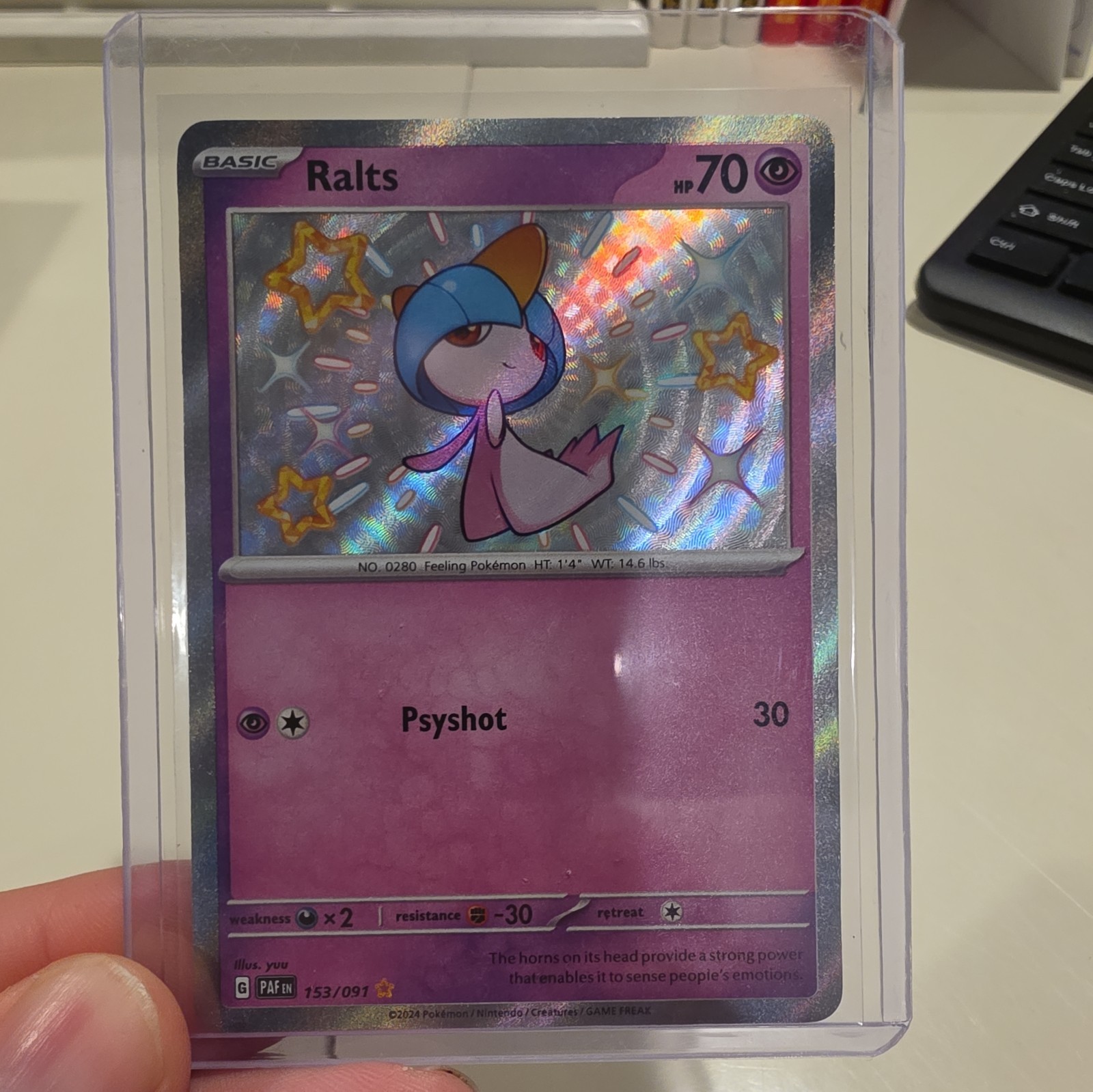 The Pokémon Company Ralts 153/091 SV Paldean Fates Holo Shiny Rare ENG