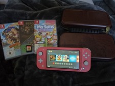 Nintendo Switch Lite Koralle Bundle mit 4 Spielen Top Zustand