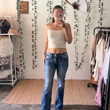 Miss Me mid-rise bootcut jeans with signature embroidered pockets size 28