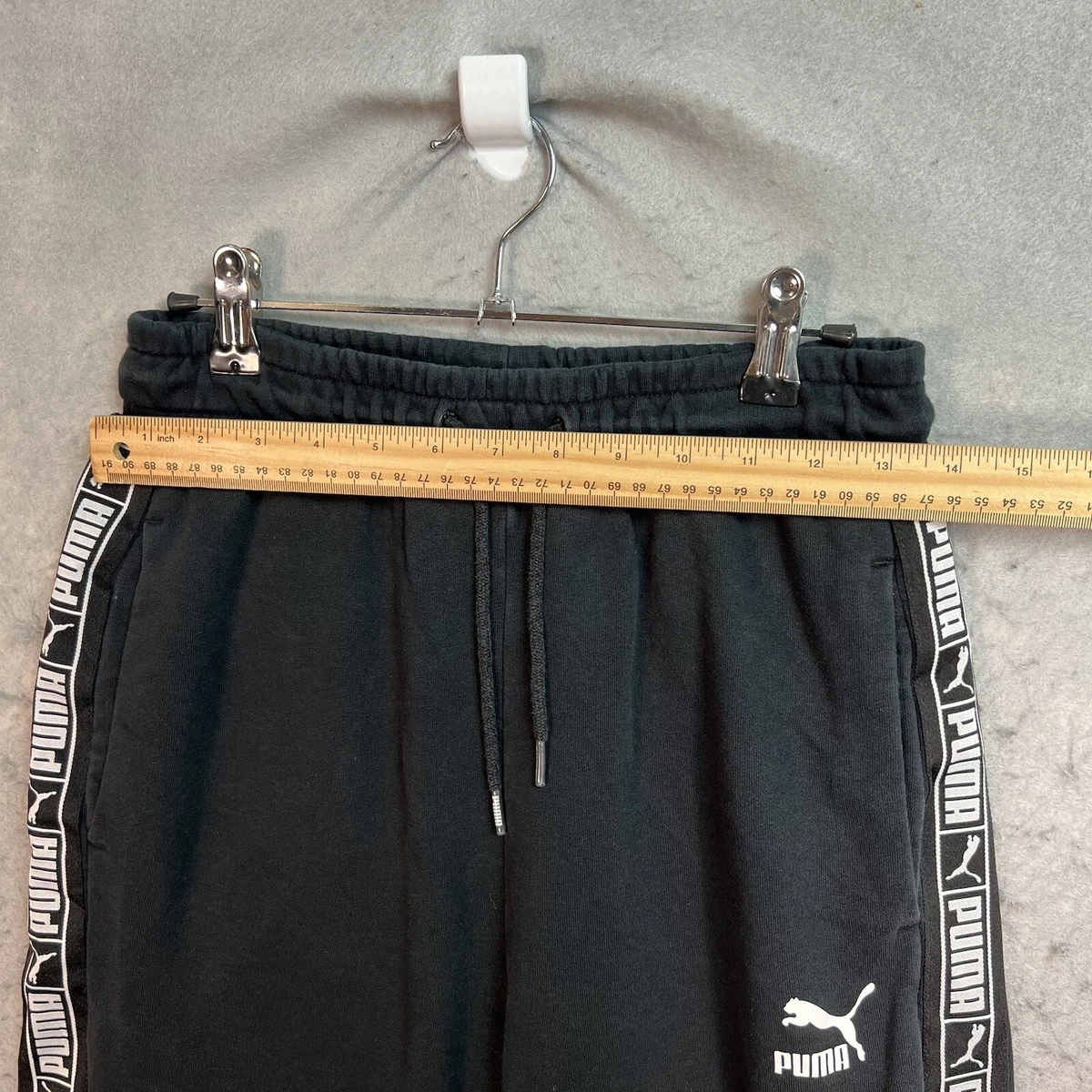 Puma logo 2025 stripe drawstring sweatpants