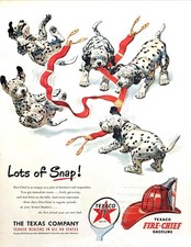 1951 Five Dalmation Puppies playing with Suspenders art Texaco vintage print ad