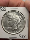 1921  PEACE SILVER DOLLAR KEY DATE COIN LOOKS AU+/ UNC!! VERY RARE***