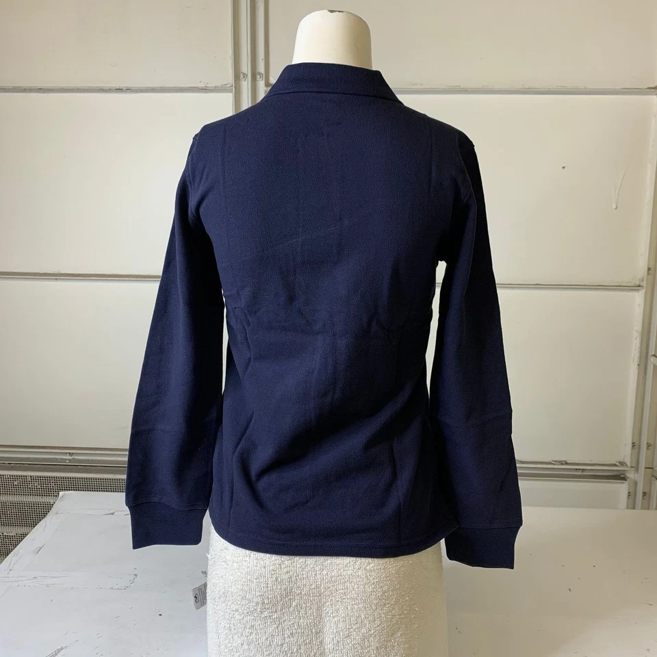 Polo uniforme de algodón orgánico GAP para niños talla L azul marino Foto 2 de 4