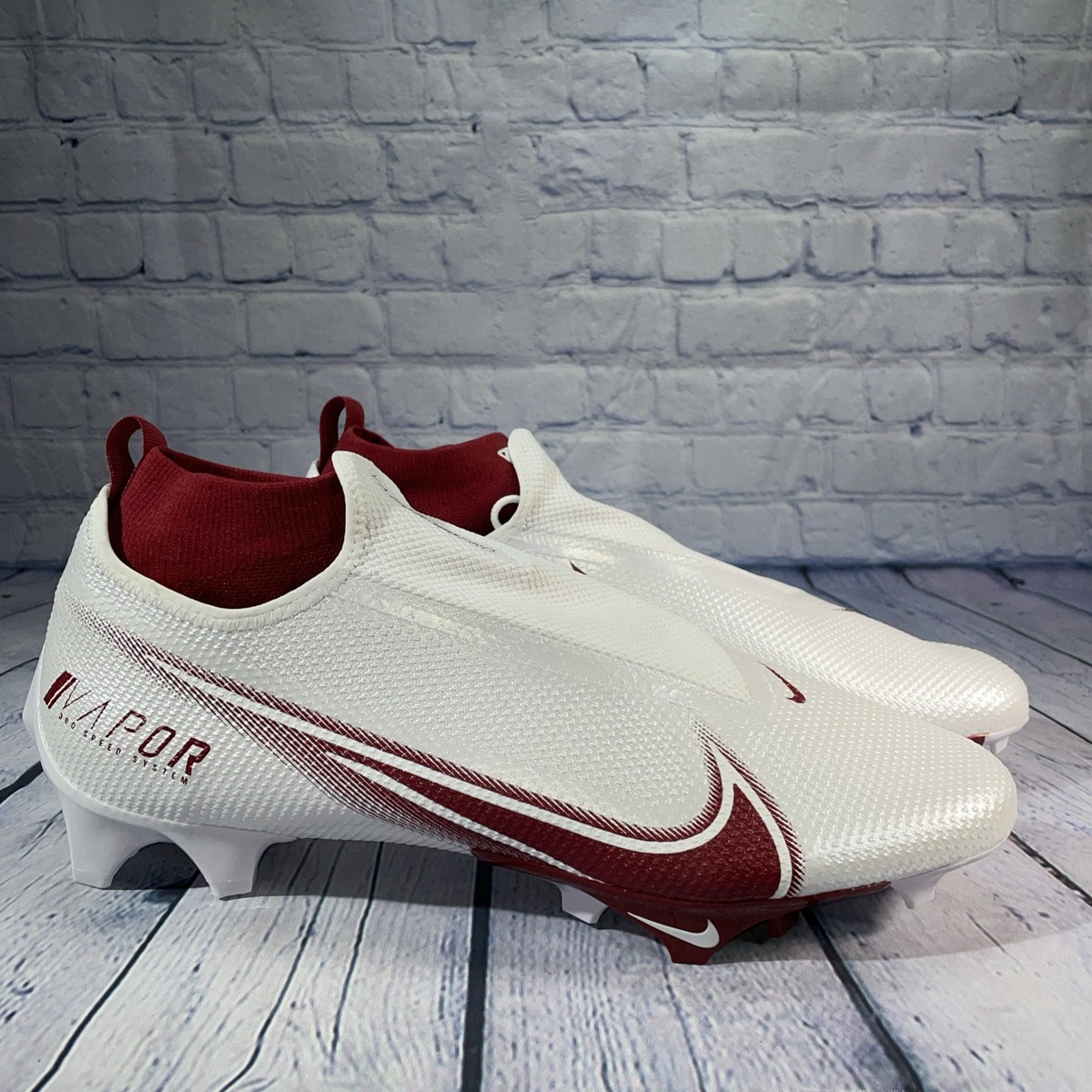 nike red and white cleats