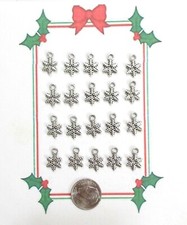 NEW--20 TIBET SILVER CHRISTMAS SNOWFLAKE CHARMS..CHRISTMAS IN JULY SALE