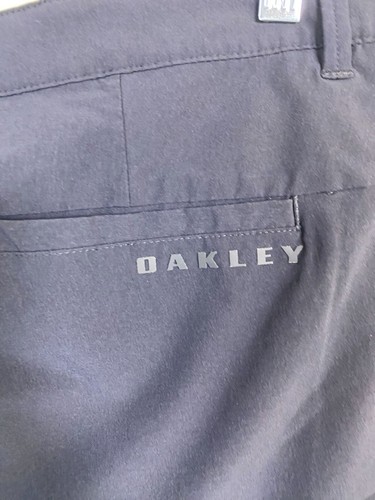 Oakley Herren Schwarz Golfshorts Größe 38 Chino Performance Neutral Outdoor 10" - Bild 9 von 16
