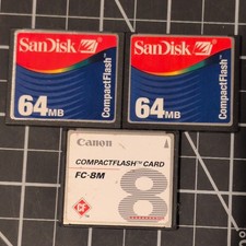 3x CompactFlash cards. 2 64MB and 1 8MB with cases.