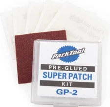 No glue necessary- 6 pc bike tire patch kit. Sandpaper included. Comes in case