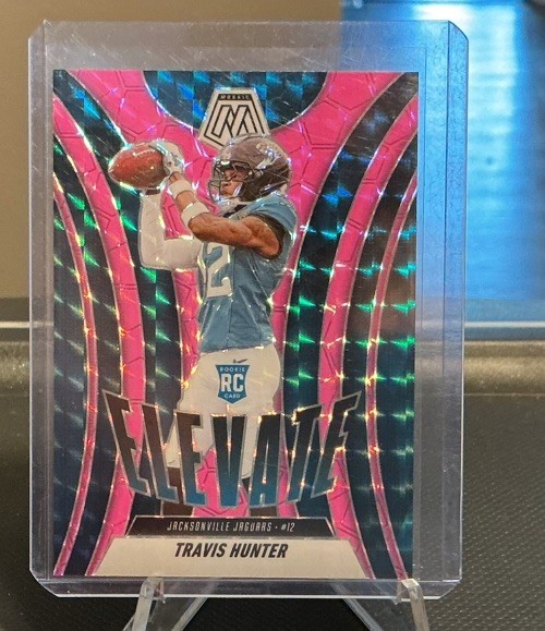 2025 Panini Mosaic - Elevate Mosaic Pink Fluorescent #1 TRAVIS HUNTER - Jaguars