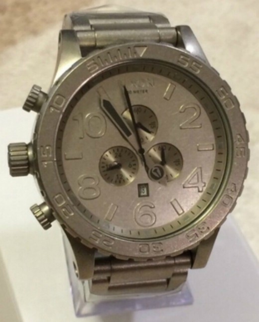 A083-1033 Watch Antique/Grey NIXON Chrono Process - Chronograph Antiquing 51-30 - vintagewatches.pk