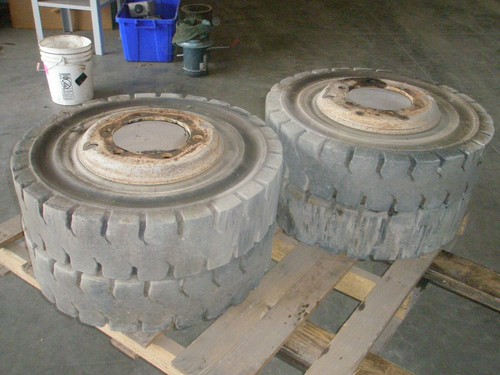 ROVINCE SUMMA SOLID FORKLIFT TIRES & RIMS, 7.00 - 15, SALE IS FOR 1 PAIR