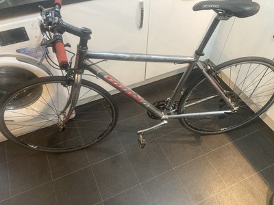 carrera gryphon hybrid bike