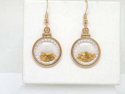 Genuine natural gold nuggets in 14k yellow gold filled rims, lens, and wires.