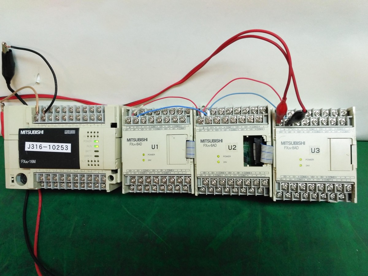 10253 MITSUBISHI PRORAMMABLE LOGIC CONTROLLER W/ 3X FX2N-8AD FX3U