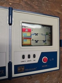 1983 Nintendo  RAIN SHOWER Game & Watch Multi Screen Handheld  Works!!!