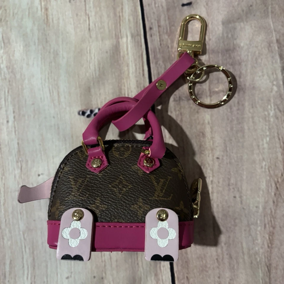 Louis Vuitton Monogram Coated Canvas Wild Puppet Elephant Keyholder/Bag Charm - Image 2 of 2