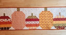 Handmade quilted table runner pumpkins and fall colors