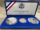 1986 Liberty/Ellis Island 3 coin gold/silver comemmorative set with box and COA
