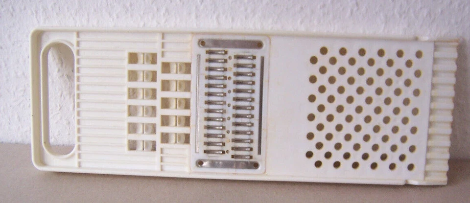 Julienne-Schneider, Raffel, Reibe, Profil-Teiler. Für Rohkost? Kunststoff, weiß