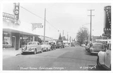 RPPC Street Scene Gresham Oregon c1940s Drug Store, Bank, Shell Gas Station, Bus