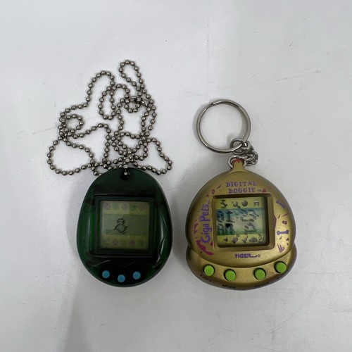 Giga Pets Digital Doggie Gold Virtual Tamagotchi and Unbranded Digital Pet 1997