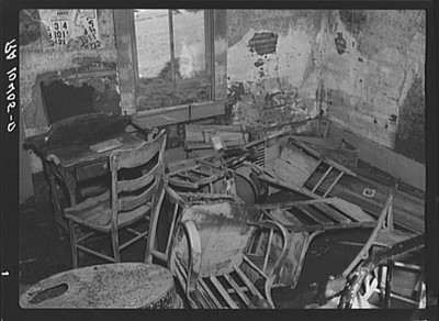 The living room in an Indiana farmhouse after the flood. Posey County