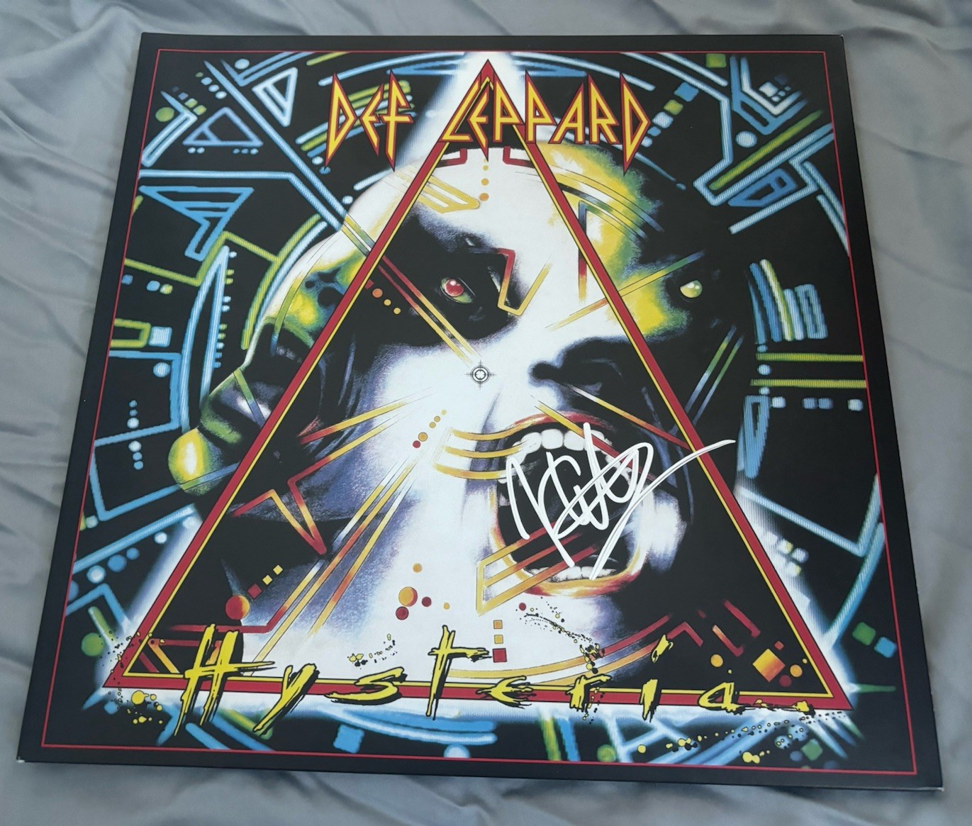 Álbum de vinilo firmado por Joe Elliott Hysteria Def Leppard con prueba